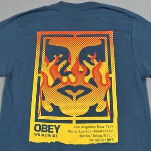 OBEY T Shirt Mens Small‎ Blue Flames Giant Face Logo Worldwide